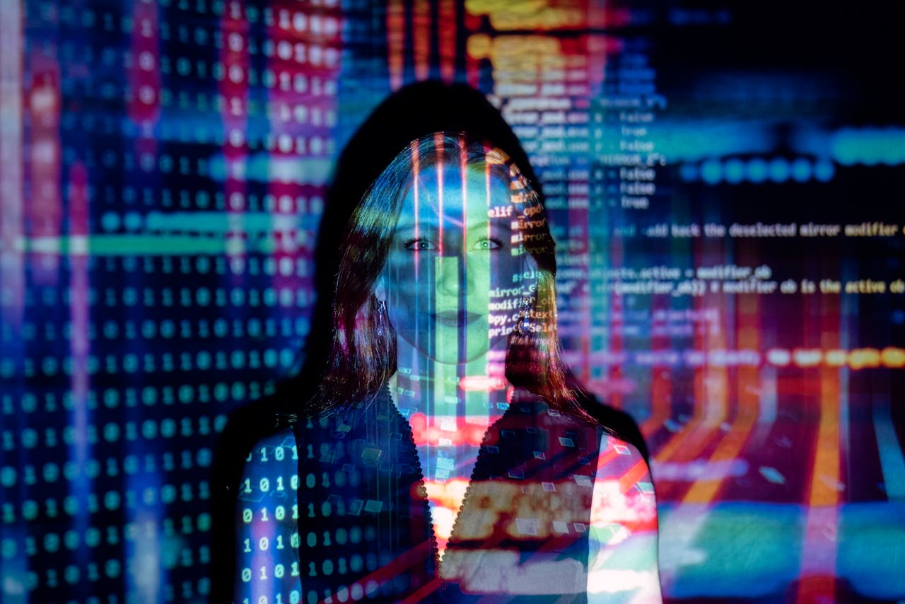 Mastering the First Impression: Your intriguing post title goes here A woman with digital code projections on her face, representing technology and future concepts.